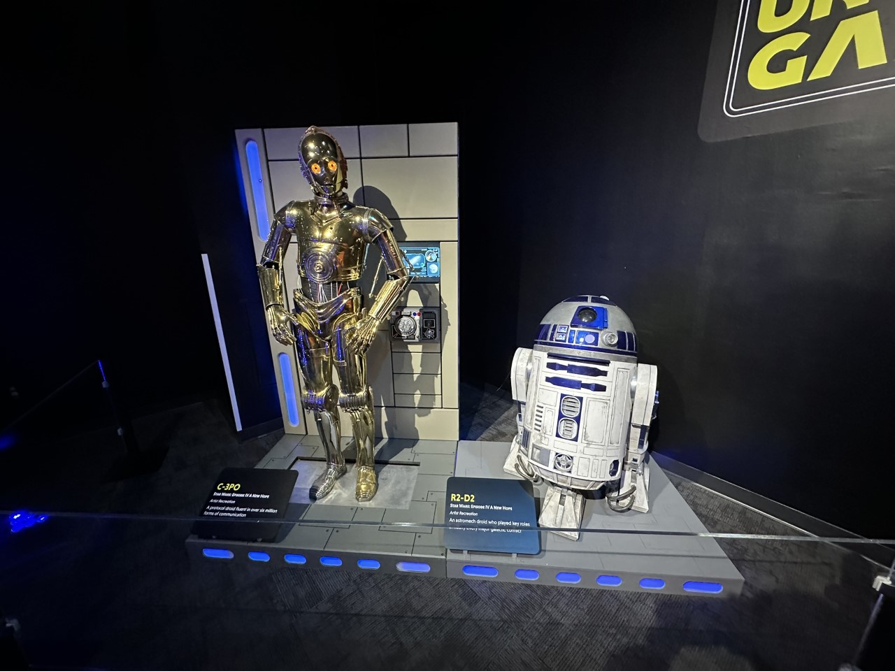 C-3PO's golden protocol droid body displayed alongside R2-D2 astromech droid