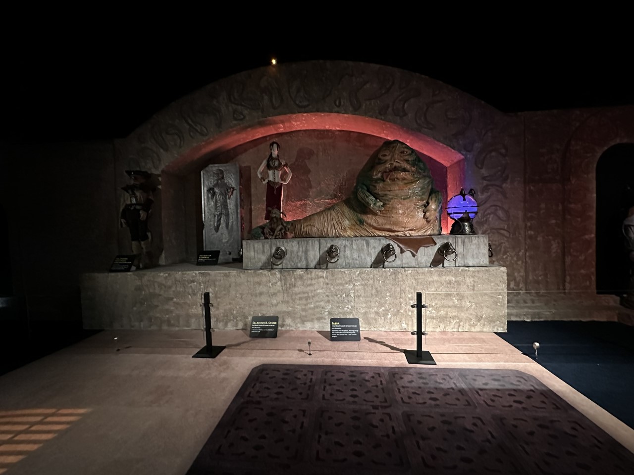 Jabba the Hutt's palace throne room with Han Solo in carbonite and Princess Leia