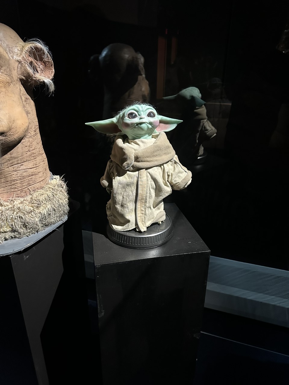 Din Grogu from The Mandalorian series in his tan robes