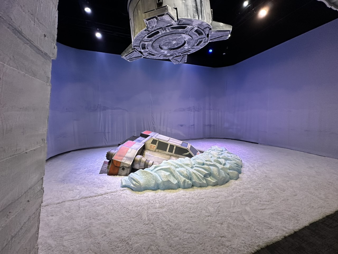 Luke Skywalker's crashed snowspeeder on Hoth with AT-AT walker leg overhead