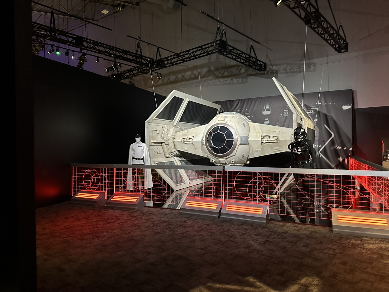 Darth Vader's TIE Advanced x1 fighter with Imperial uniforms in Death Star hangar setting