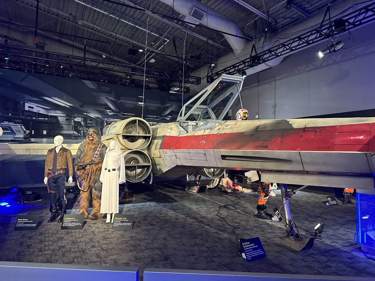 Another angle of the massive X-wing display with Rebel pilot gear and droids