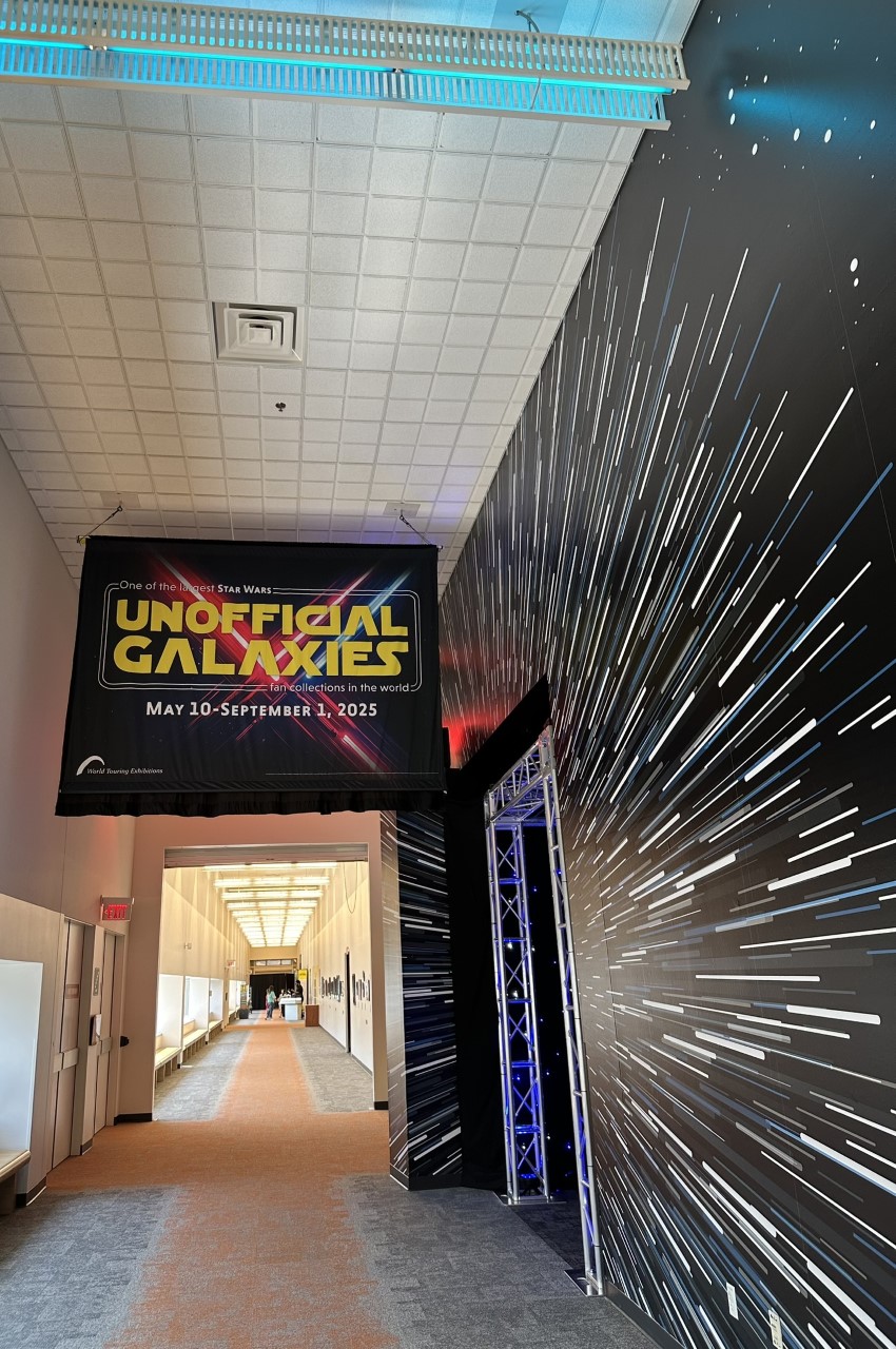 Dramatic entrance to the Unofficial Galaxies exhibit with hyperspace effect and exhibition signage